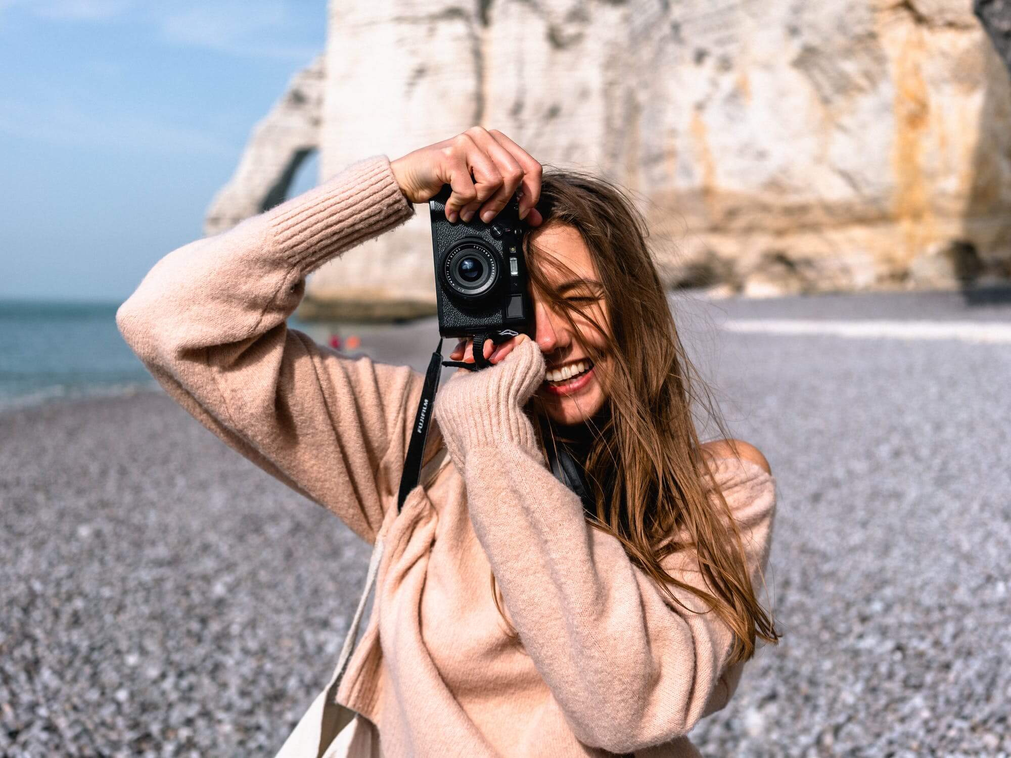 a person holding a camera