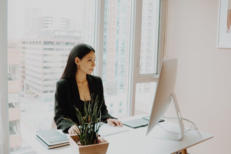 a woman sitting at a desk