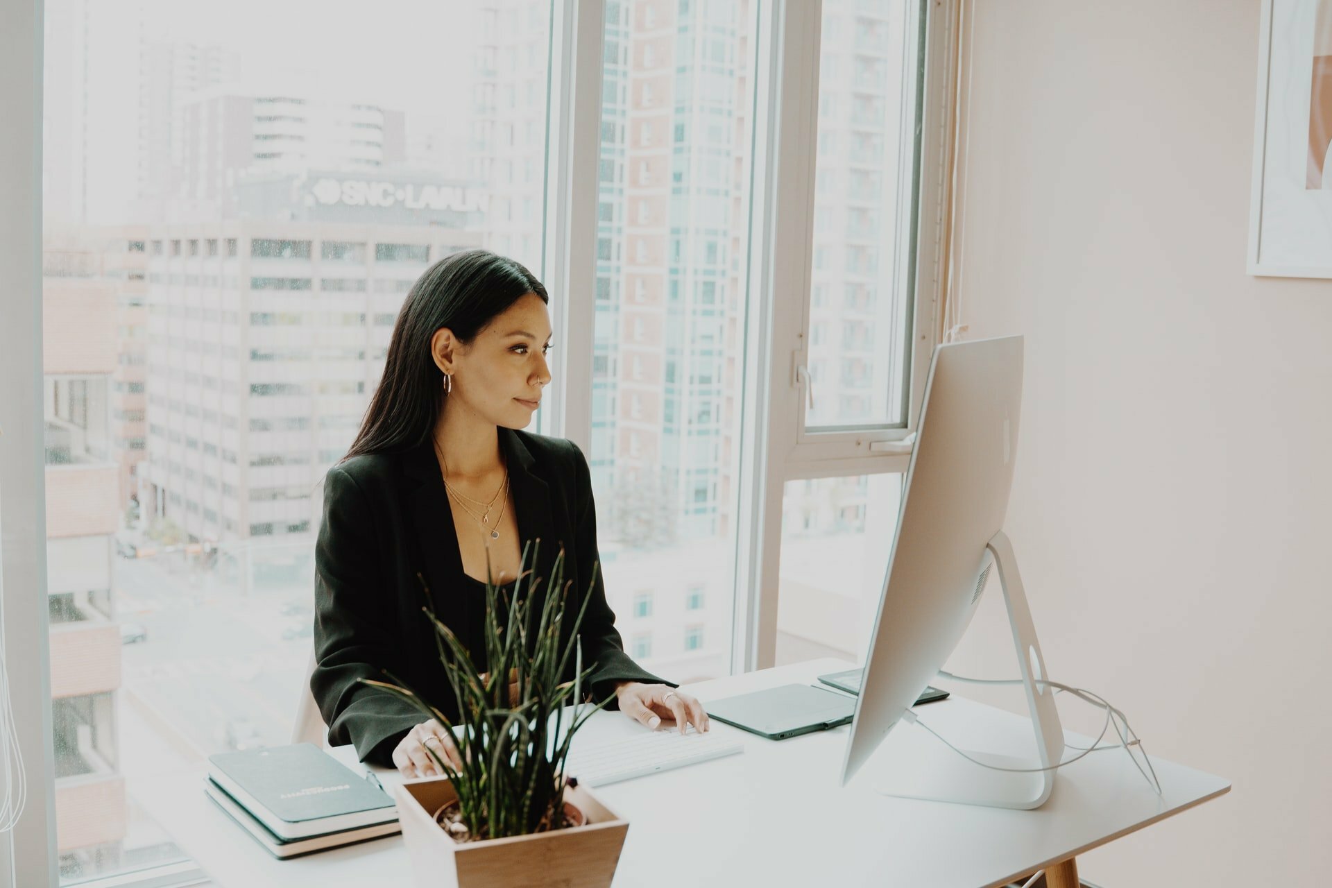 a woman sitting at a desk