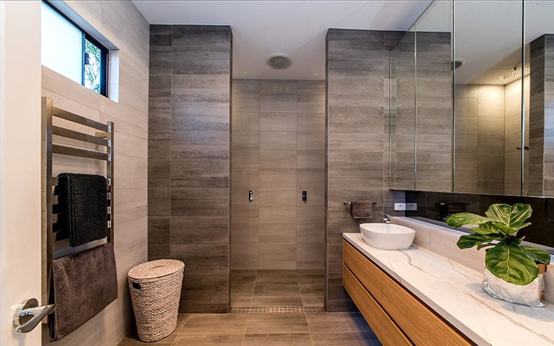 a bathroom with a sink and a shower