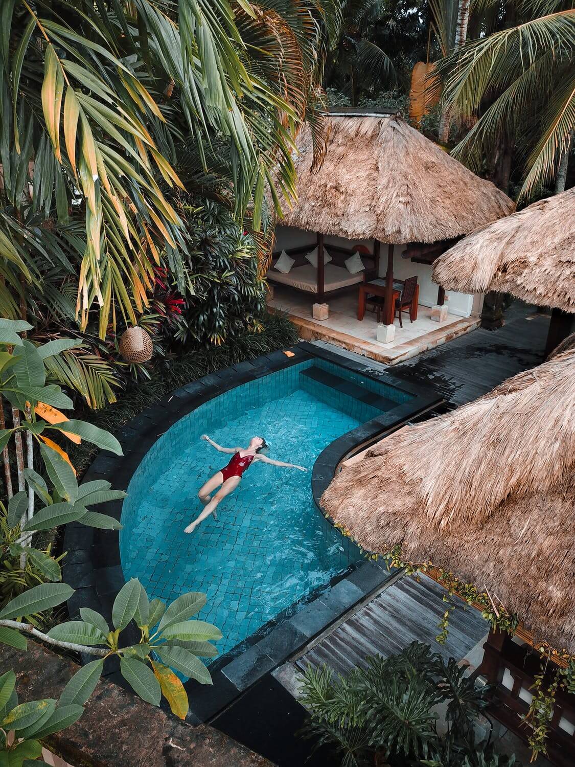 a model of a boat in a tropical setting