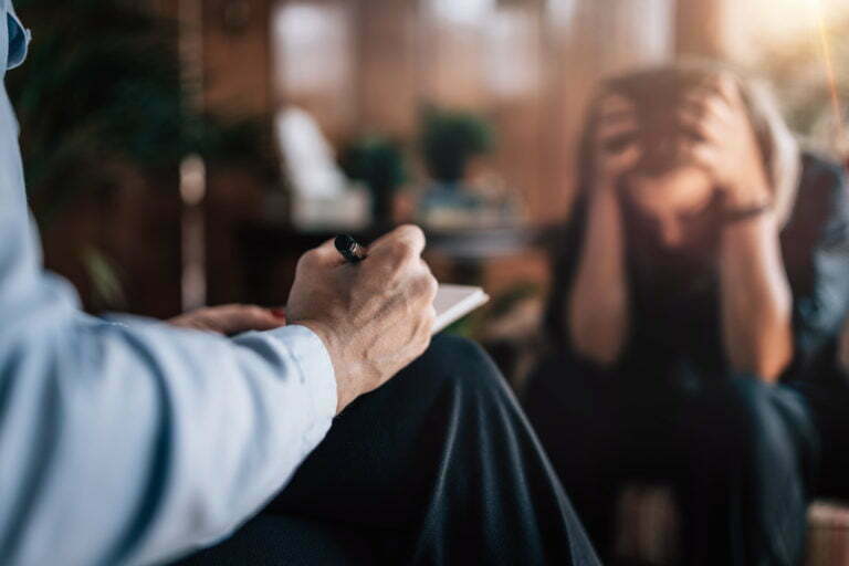 a man holding his head