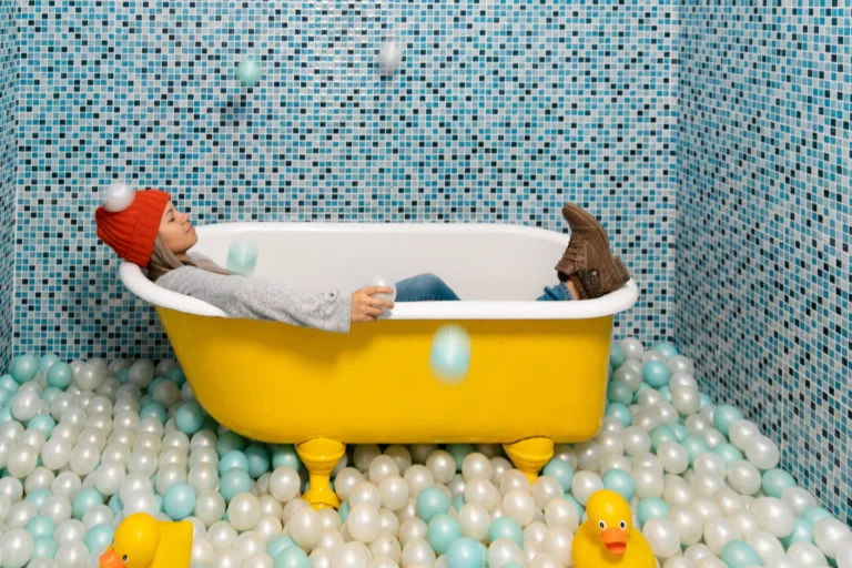 Girl in a Yellow Tub